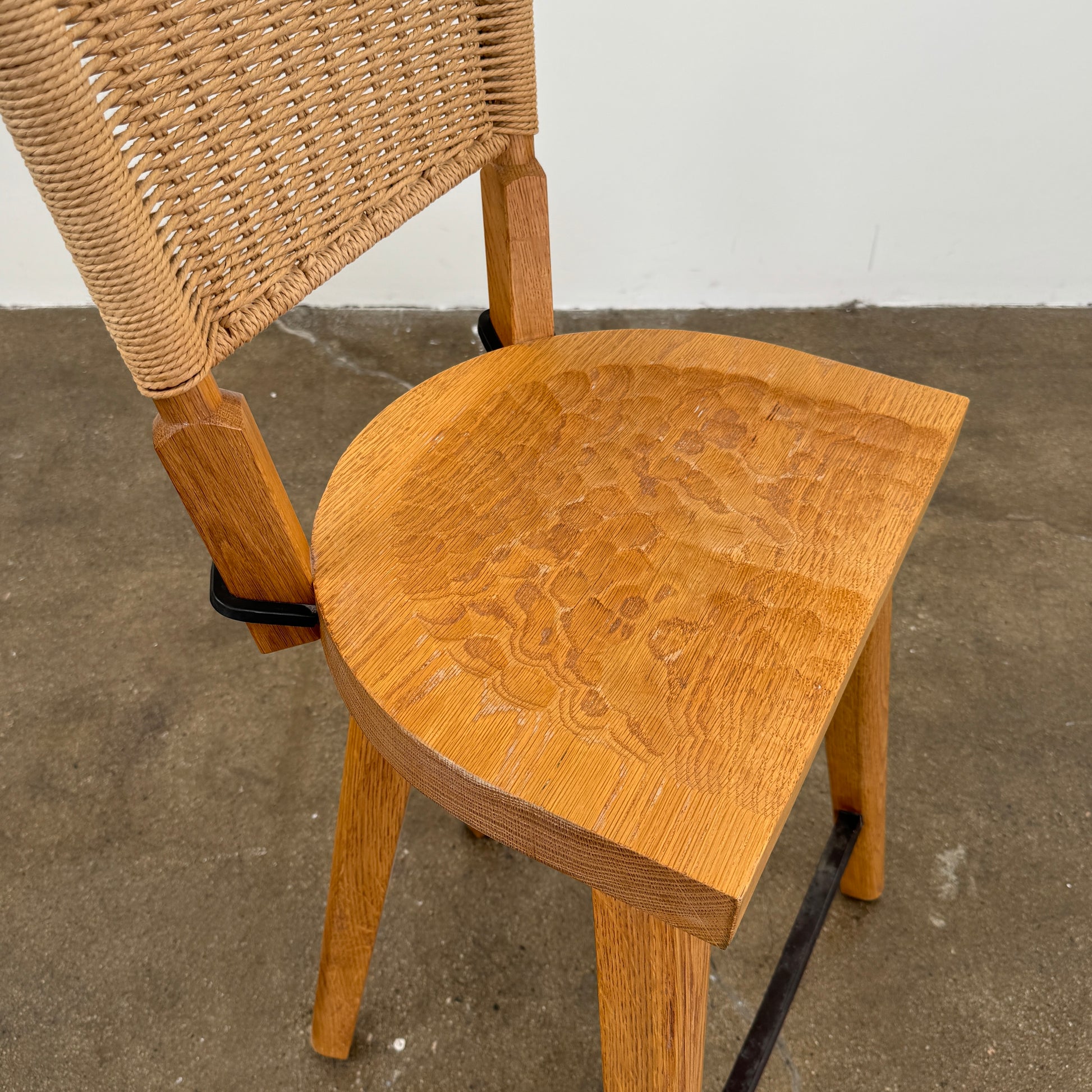 The Furniture Marolles Counter Stool Set of 3 by Furniture Marolles, featuring wooden construction and woven backrests inspired by handcrafted design, is arranged side by side against a plain white background.