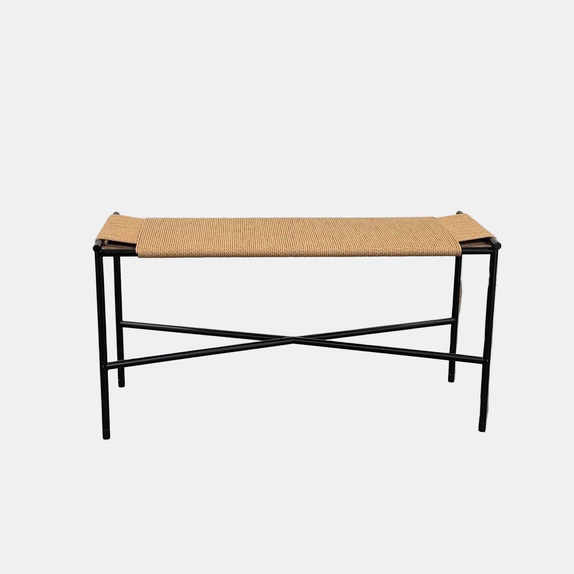 Fritz Hansen Skagerak VENT Bench by Fritz Hansen, featuring a rectangular black metal frame with minimalist crossed supports underneath and a woven tan paper cord seat, shown on a plain white background.