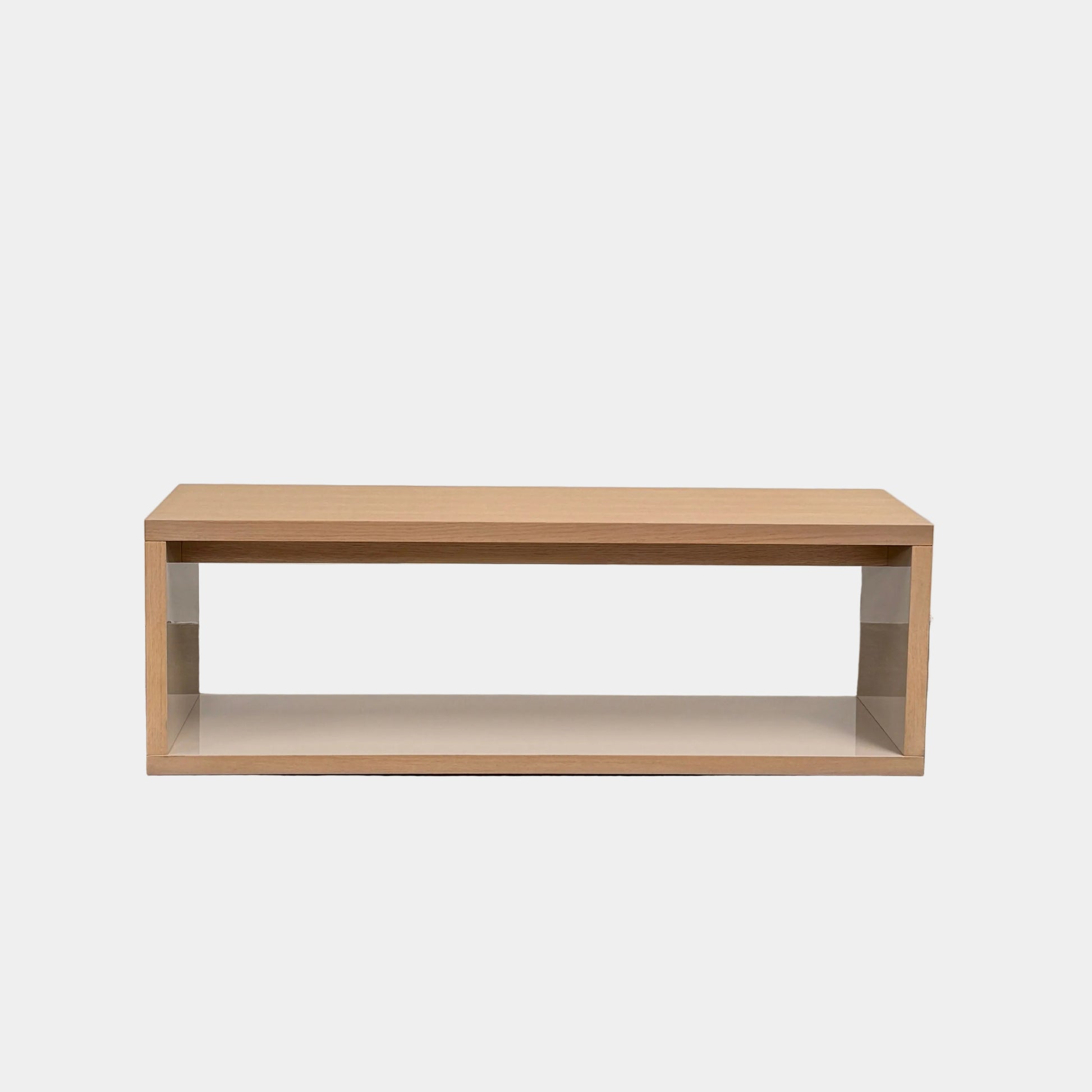 The B&B Italia Frank Low Console by B&B Italia rests on a polished concrete floor against a plain white wall.