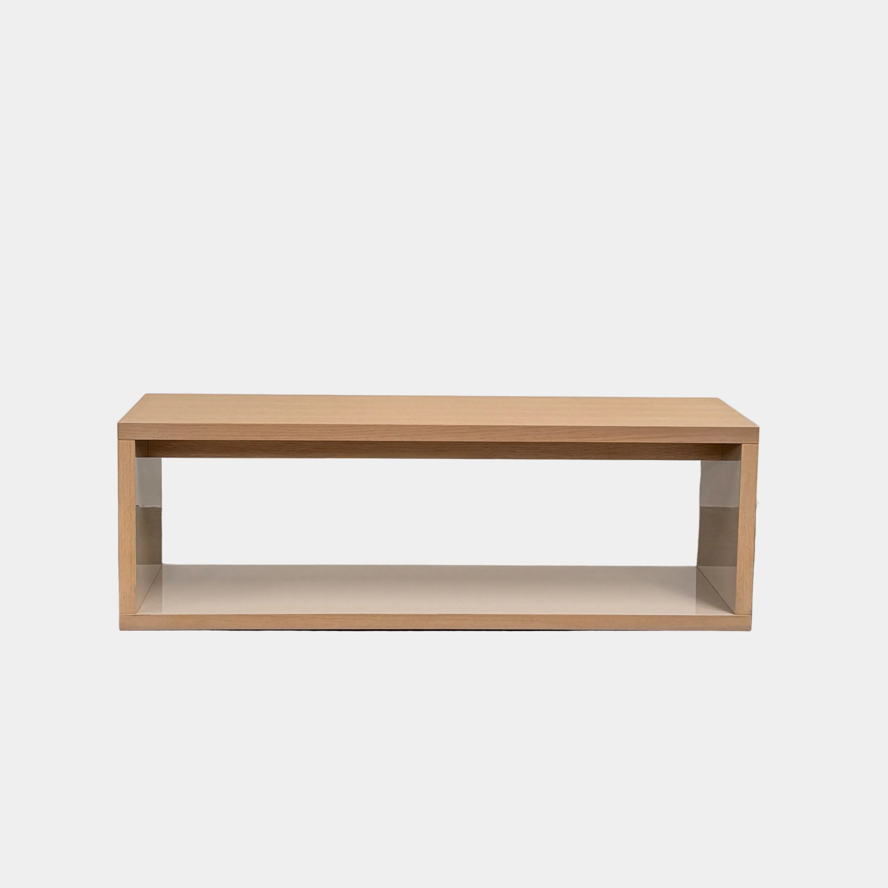 The B&B Italia Frank Low Console by B&B Italia rests on a polished concrete floor against a plain white wall.