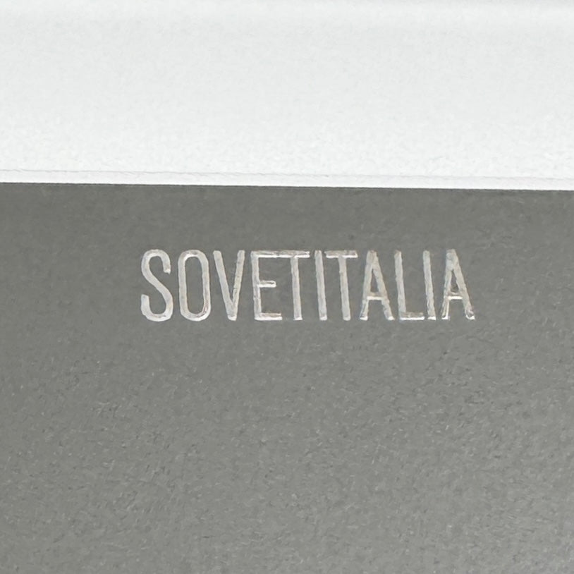 A minimalist rectangular Sovet Slim Extendable Dining Table in gray with four straight legs, designed by Sovet and photographed against a white background.