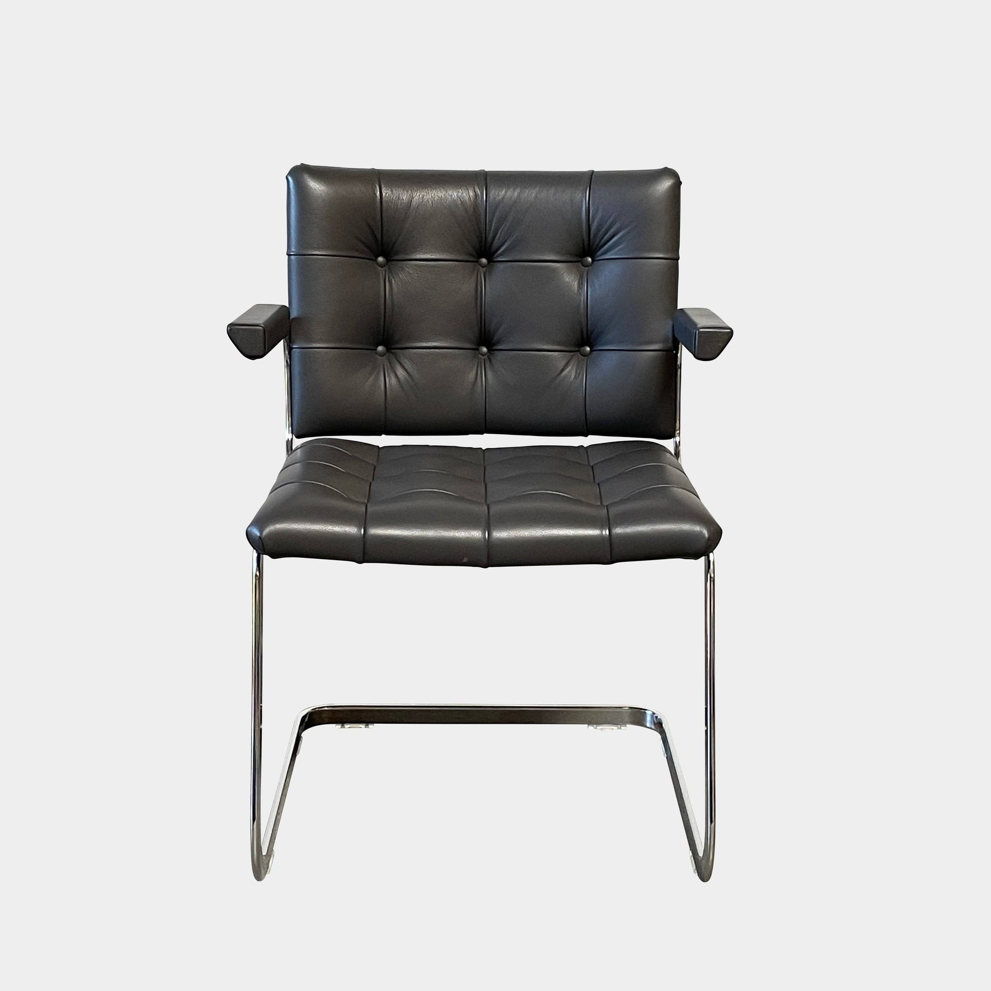 A pair of De Sede RH-305 Dining Chairs, perfect for seating comfort in any living space.