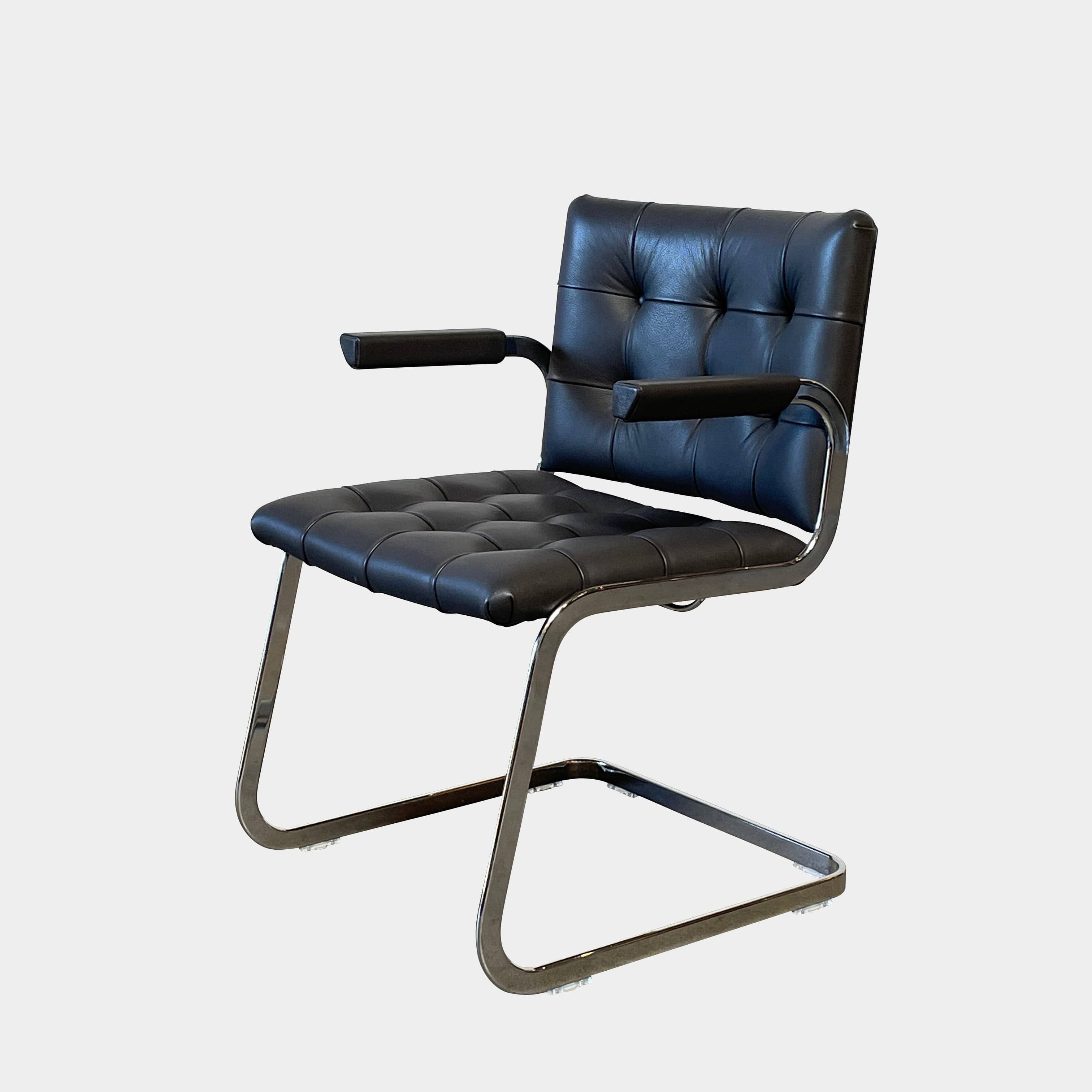 A pair of De Sede RH-305 Dining Chairs, perfect for seating comfort in any living space.