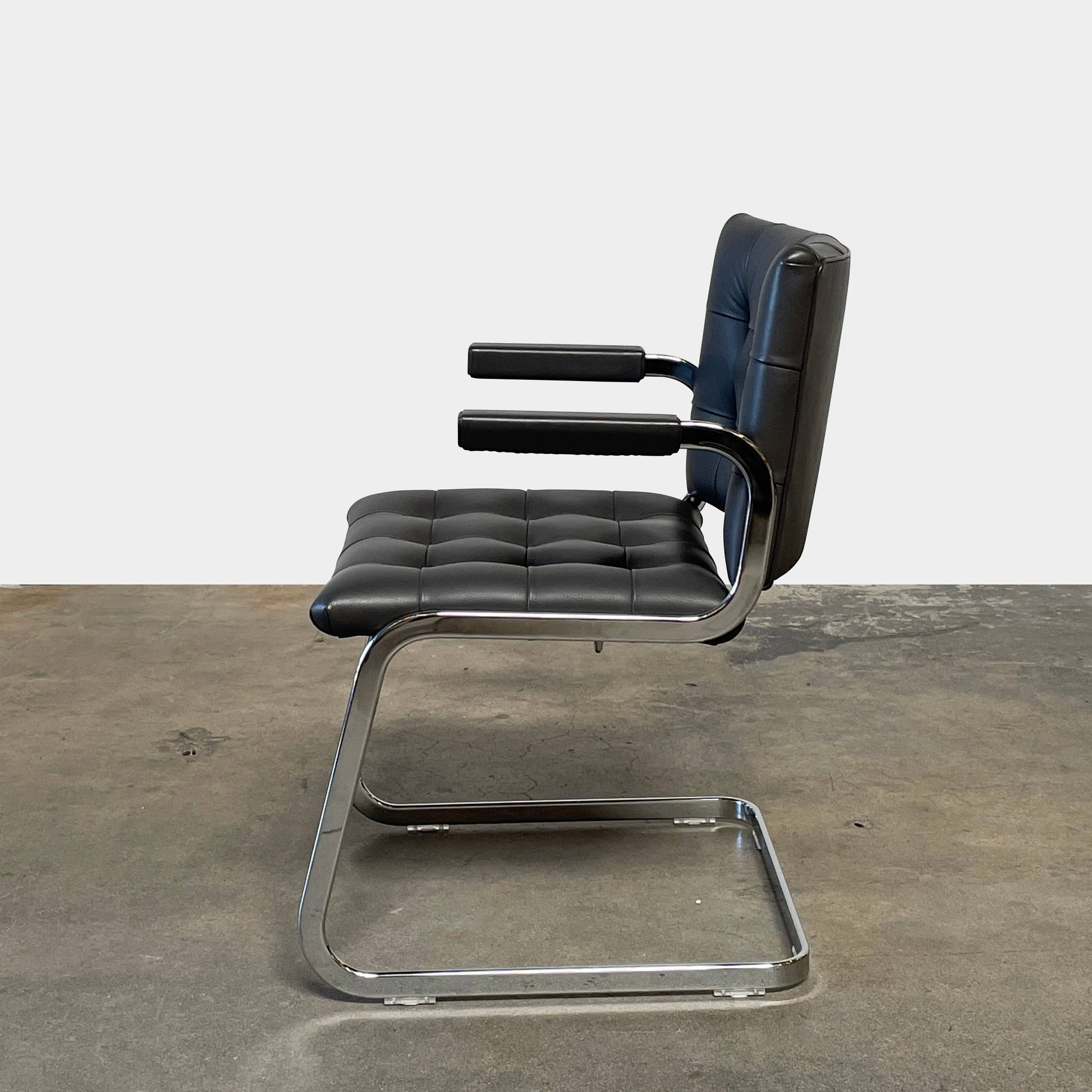 A pair of De Sede RH-305 Dining Chairs, perfect for seating comfort in any living space.