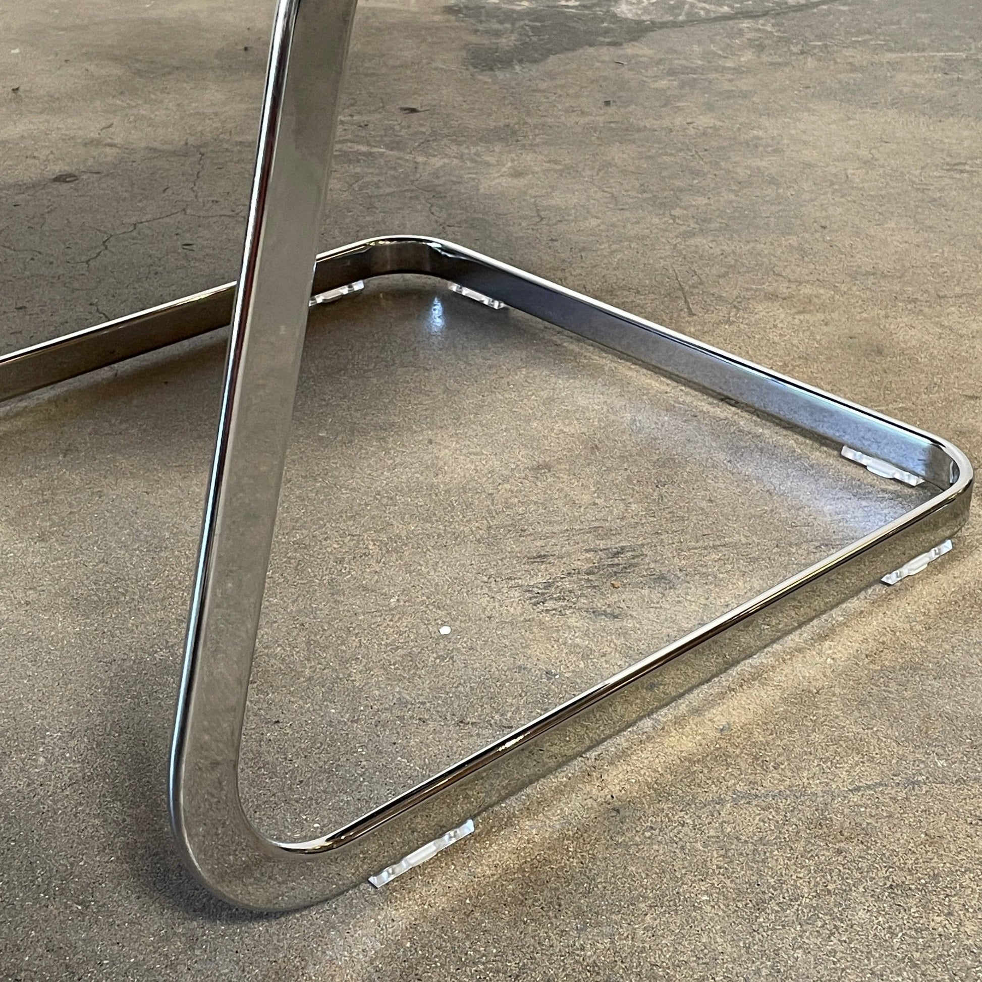 A pair of De Sede RH-305 Dining Chairs, perfect for seating comfort in any living space.