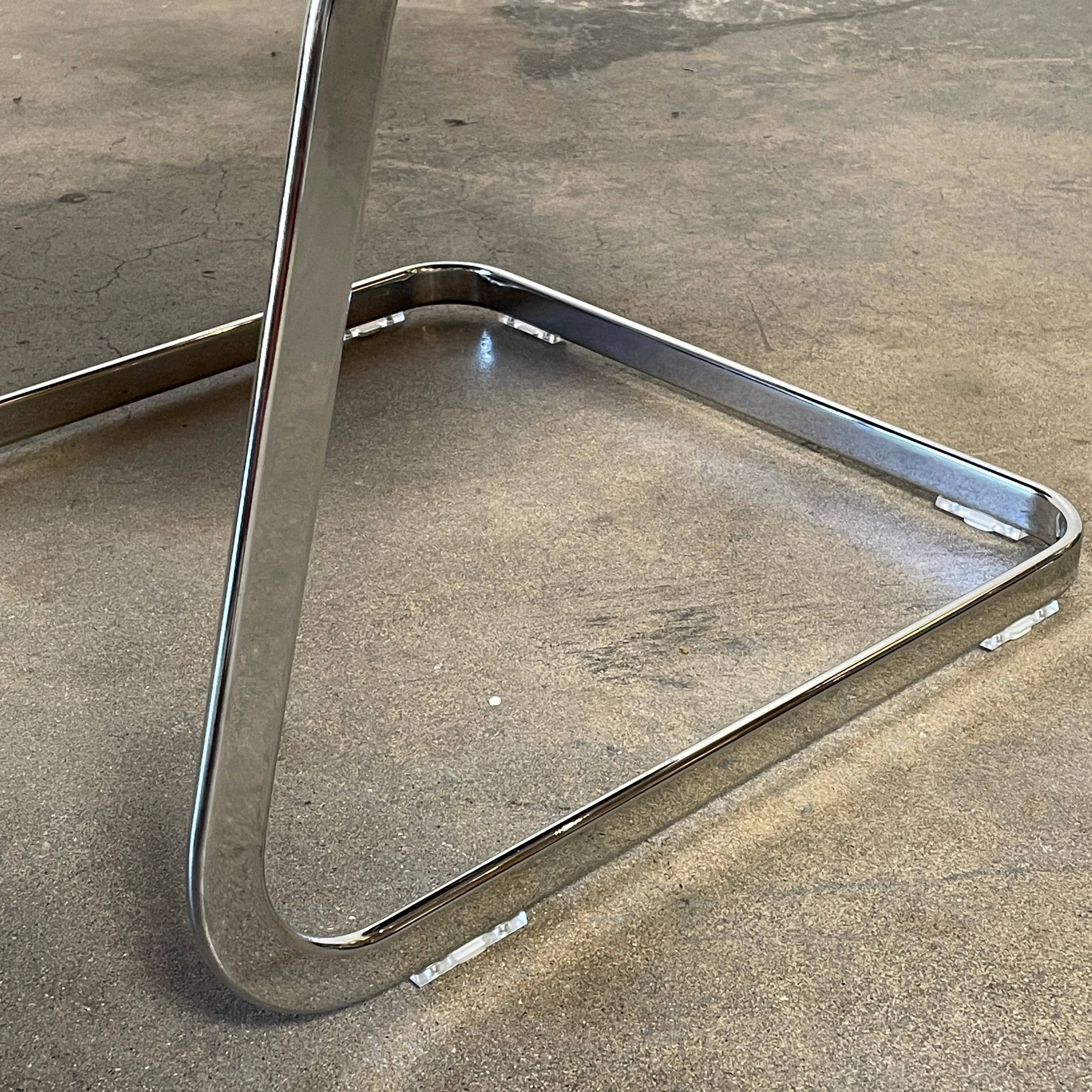 A pair of De Sede RH-305 Dining Chairs, perfect for seating comfort in any living space.