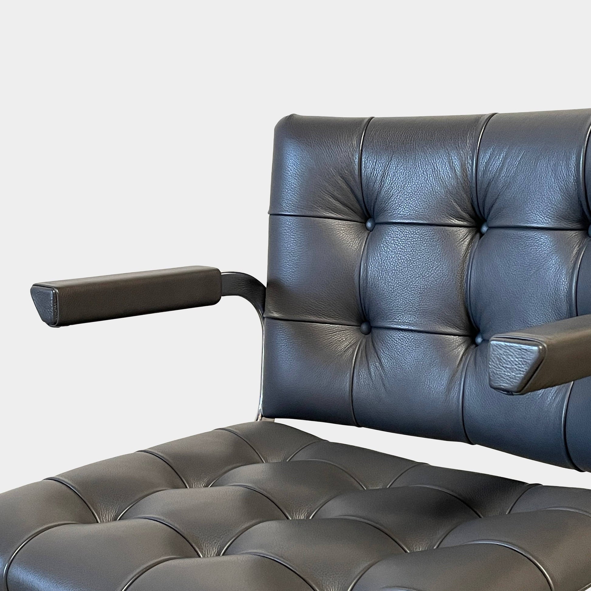 A pair of De Sede RH-305 Dining Chairs, perfect for seating comfort in any living space.