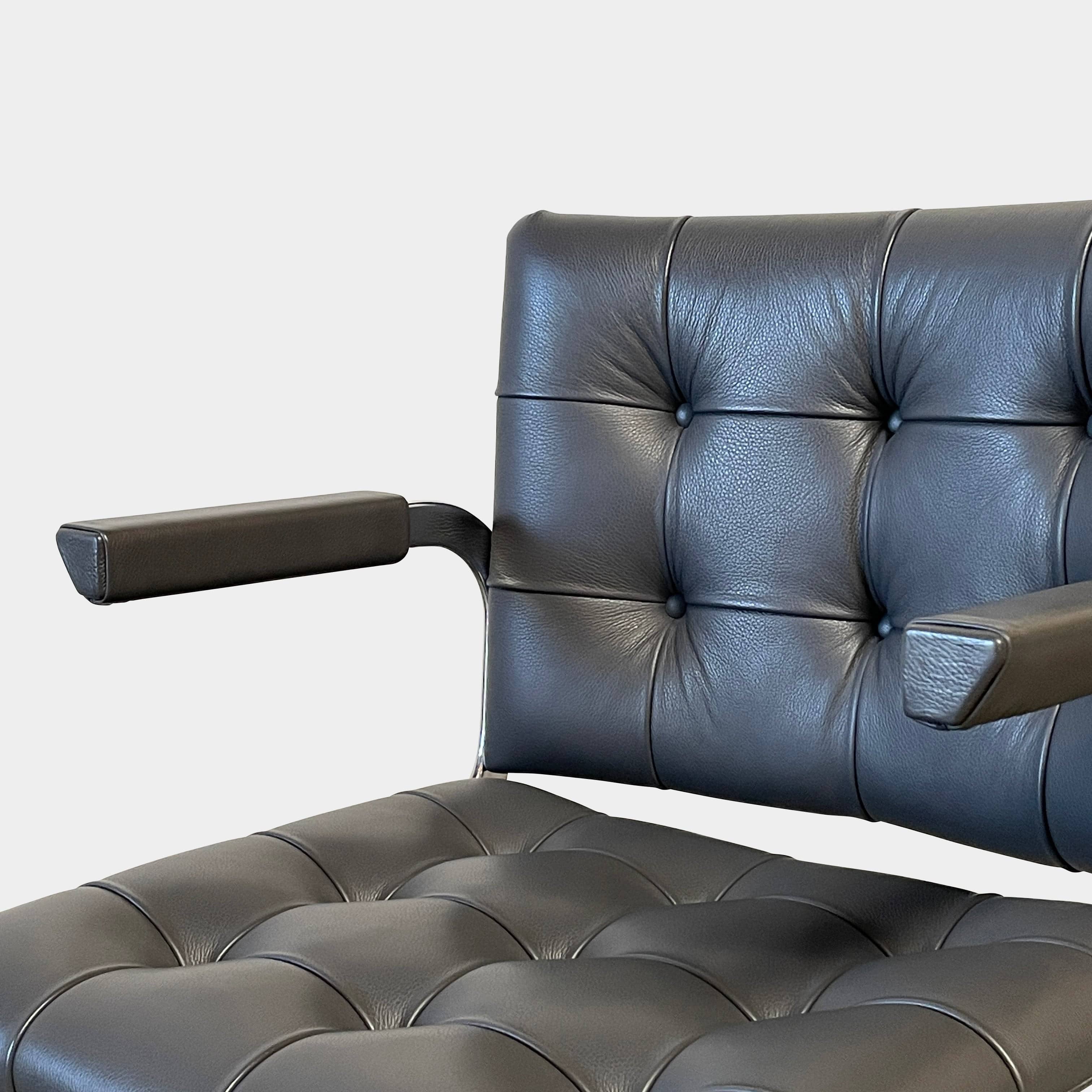 A pair of De Sede RH-305 Dining Chairs, perfect for seating comfort in any living space.