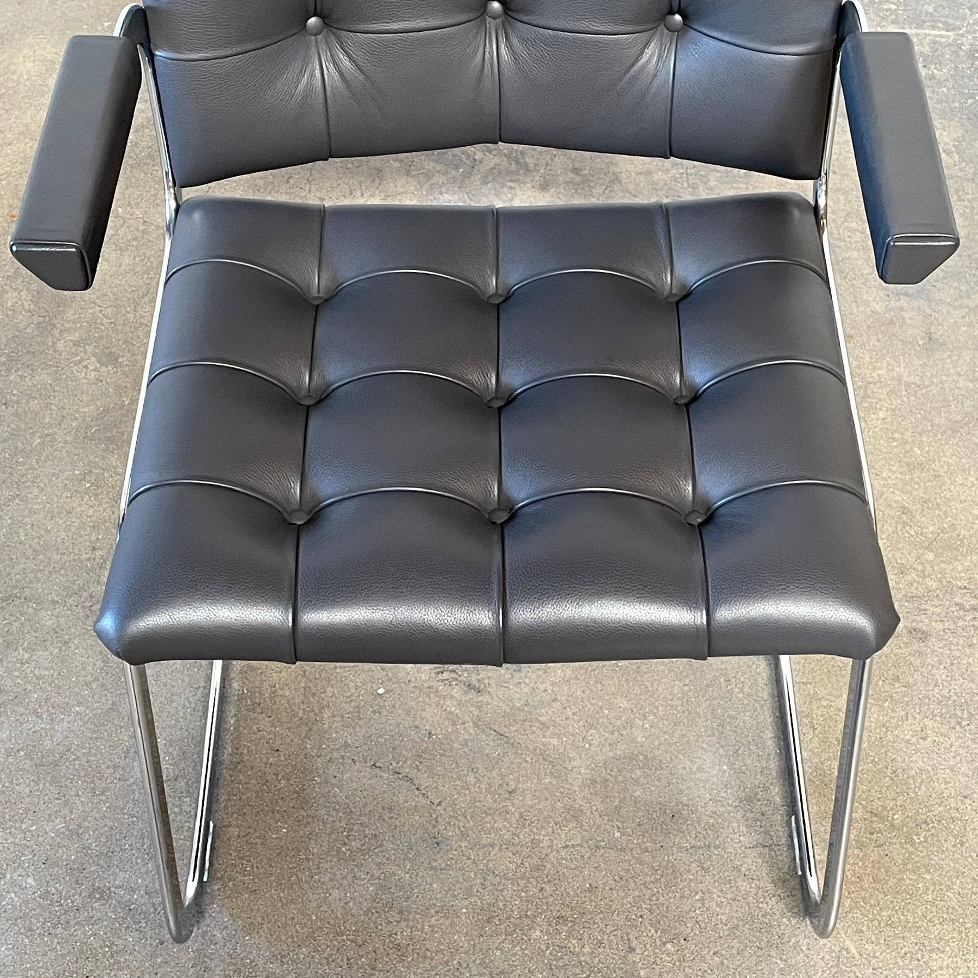 A pair of De Sede RH-305 Dining Chairs, perfect for seating comfort in any living space.