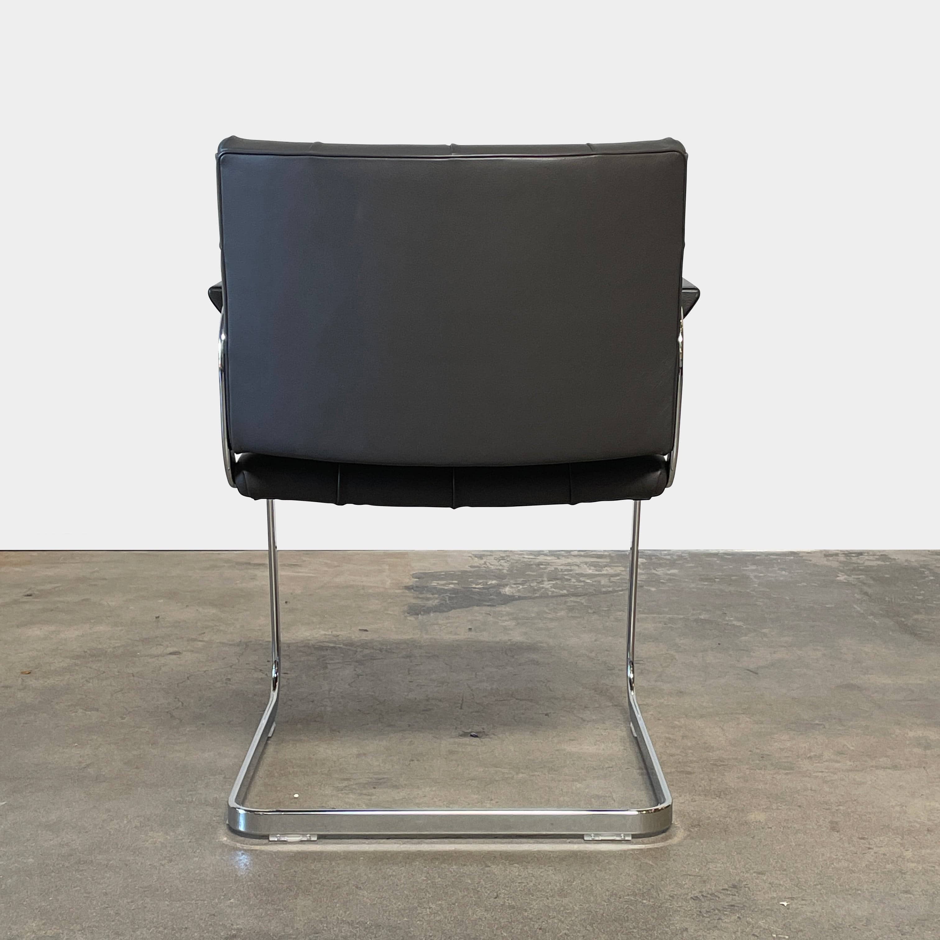 A pair of De Sede RH-305 Dining Chairs, perfect for seating comfort in any living space.