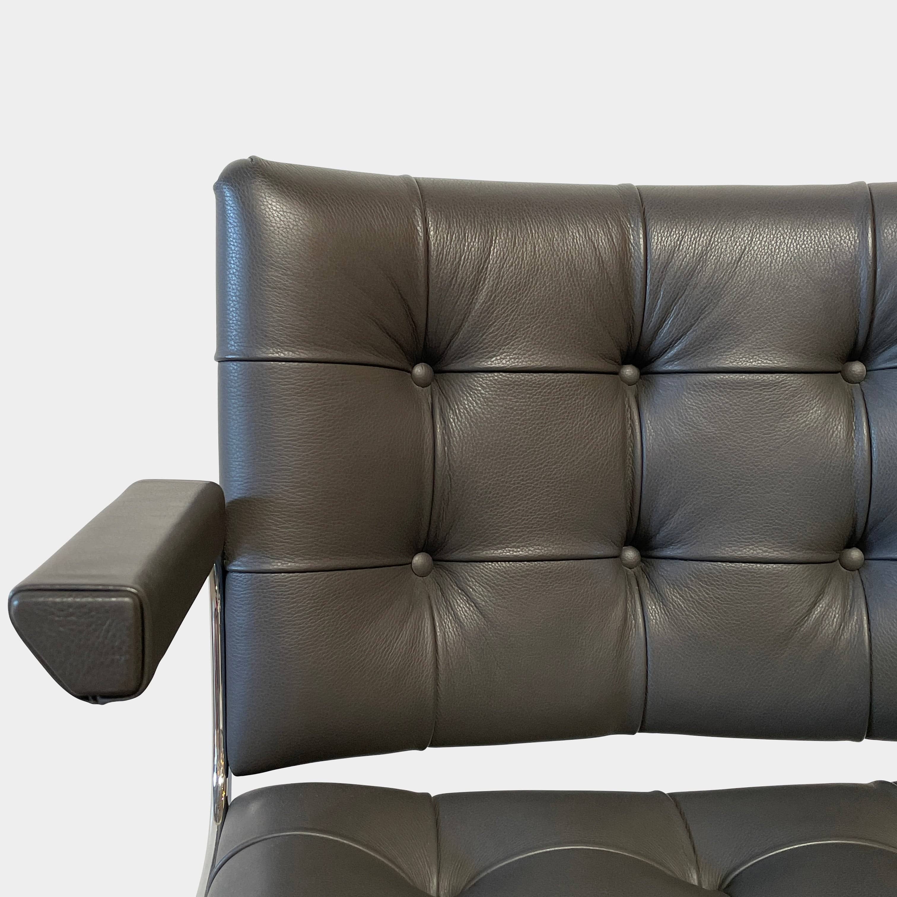 A pair of De Sede RH-305 Dining Chairs, perfect for seating comfort in any living space.