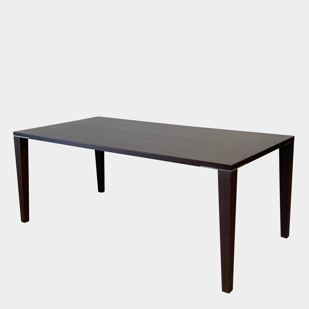 A rectangular Fashion Dining Table made of wenge wood, featuring dark wood legs.