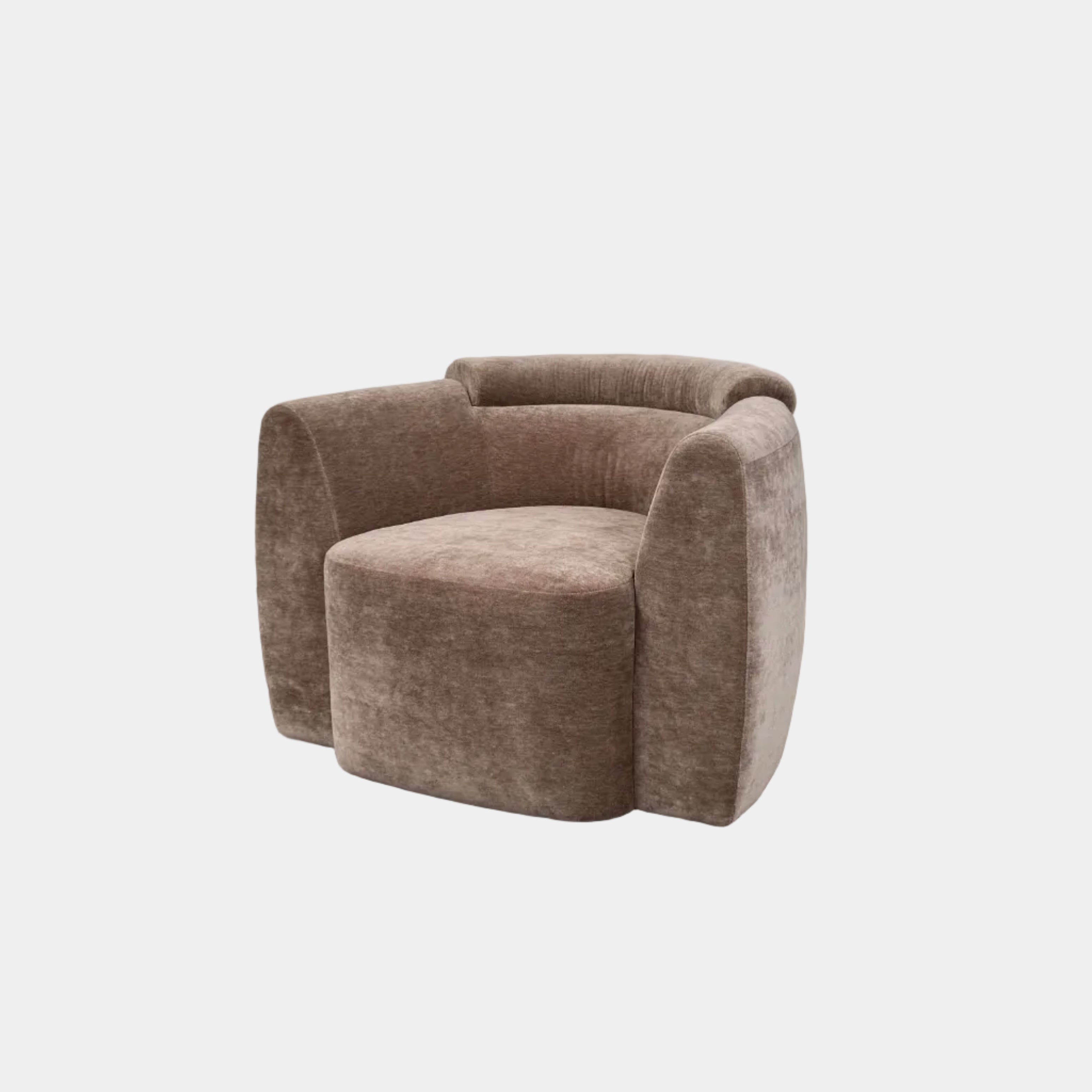 Two Daniel Boddam Wave Lounge Chairs in Maharam Mohair, featuring plush taupe upholstery with rounded backs and arms, are arranged side by side on a polished concrete floor against a plain white wall.