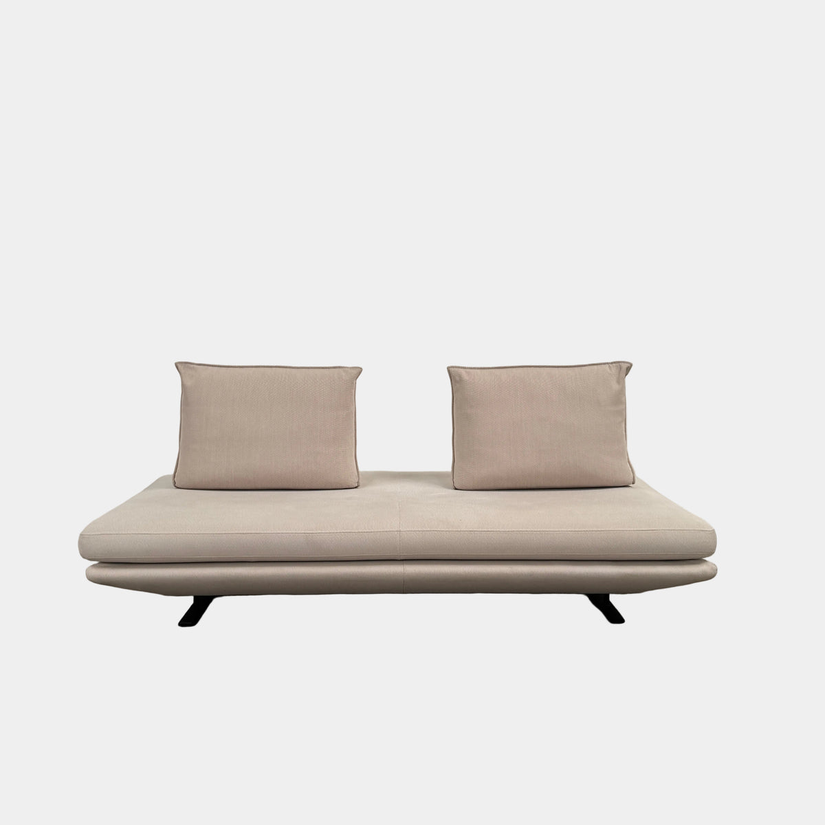 Ligne Roset Prado Sofa with 2 Backrests by Ligne Roset, featuring a beige modern design, two rectangular back cushions, and black angled legs, offering flexible seating options and set against a plain white background.