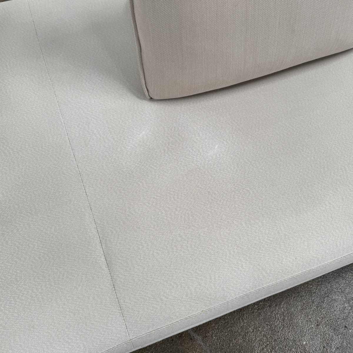 Ligne Roset Prado Sofa with 2 Backrests by Ligne Roset, featuring a beige modern design, two rectangular back cushions, and black angled legs, offering flexible seating options and set against a plain white background.