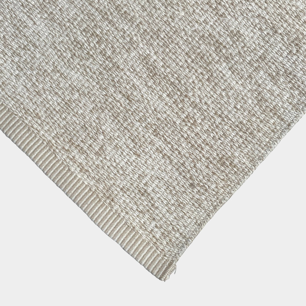 A Kasthall Haaga Rug beautifully contrasts against a white background.