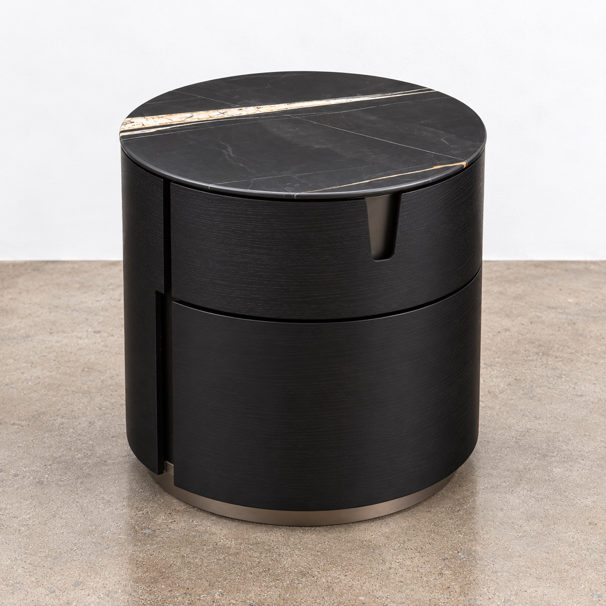 Two cylindrical Porada Tylsa 54 Nightstand Set of 2 units with dark marble tops featuring a single light-colored vein.