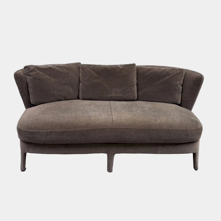 Small gray Maxalto Febo Small Sofa with a curved back, three back cushions, and visible stitched seams.