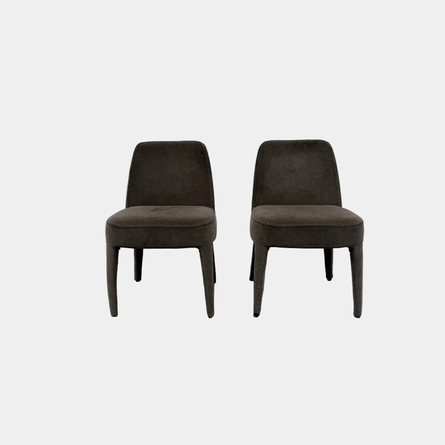 Two dark gray Maxalto Febo dining chairs with backrests, leather upholstery, and four tapered legs.
