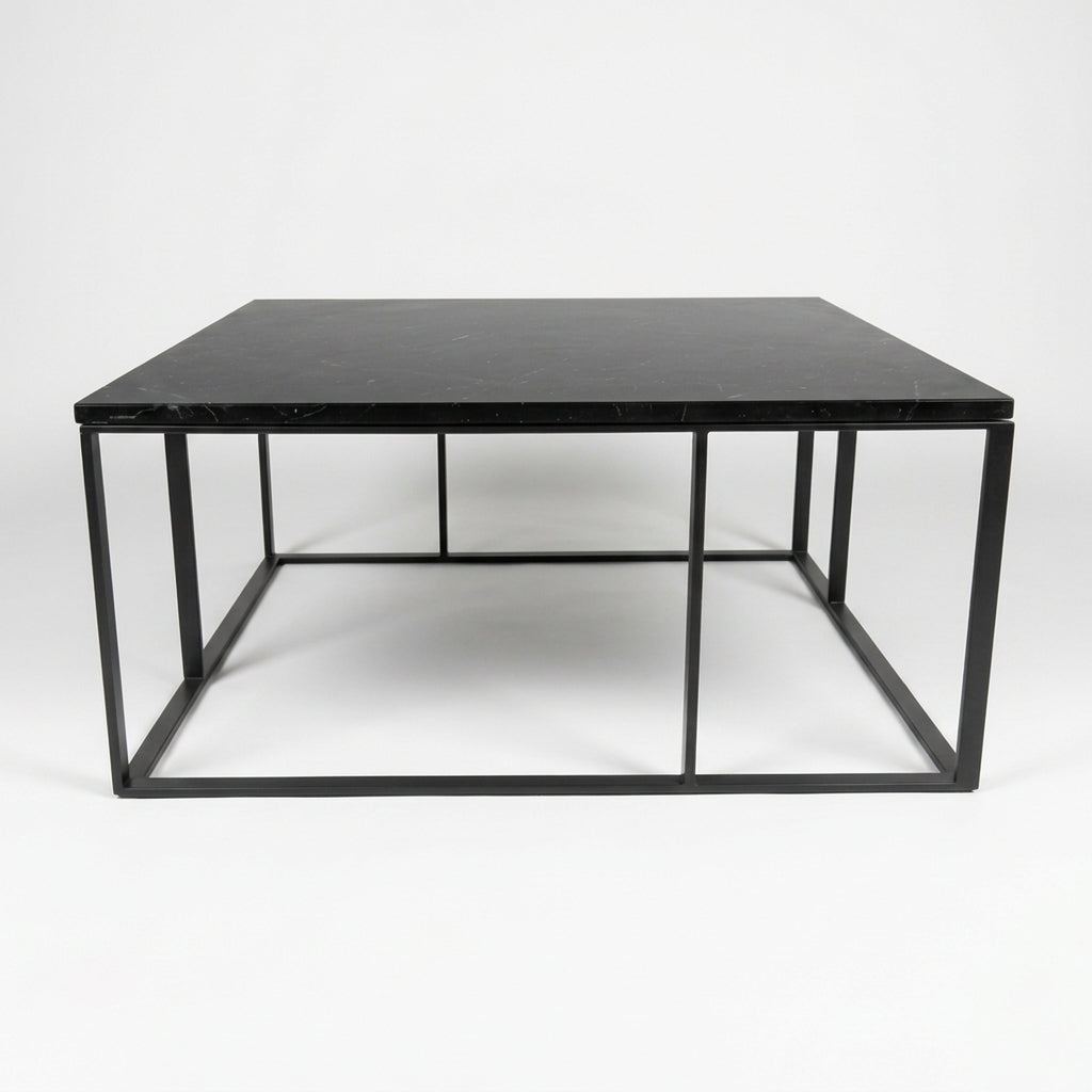 Square Maxalto Lithos coffee table with a black marble top and a black metal frame.