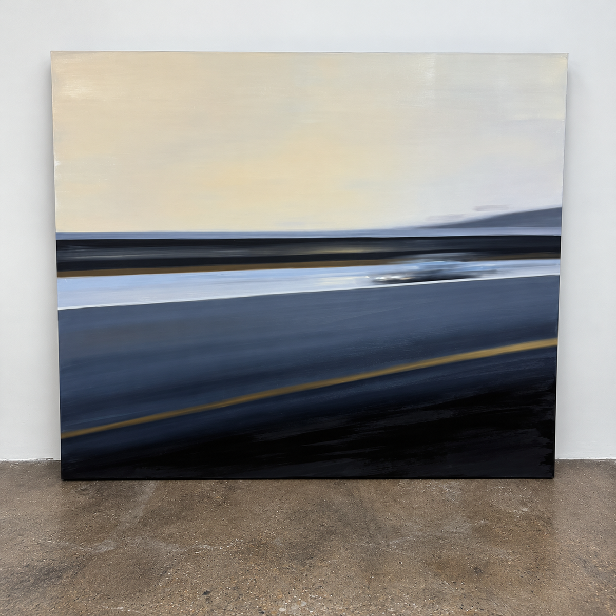 An abstract oil on canvas painting by Miguel Osuna titled “Chase,” depicting a blurred vehicle moving across a dark road against a pale, overcast sky.