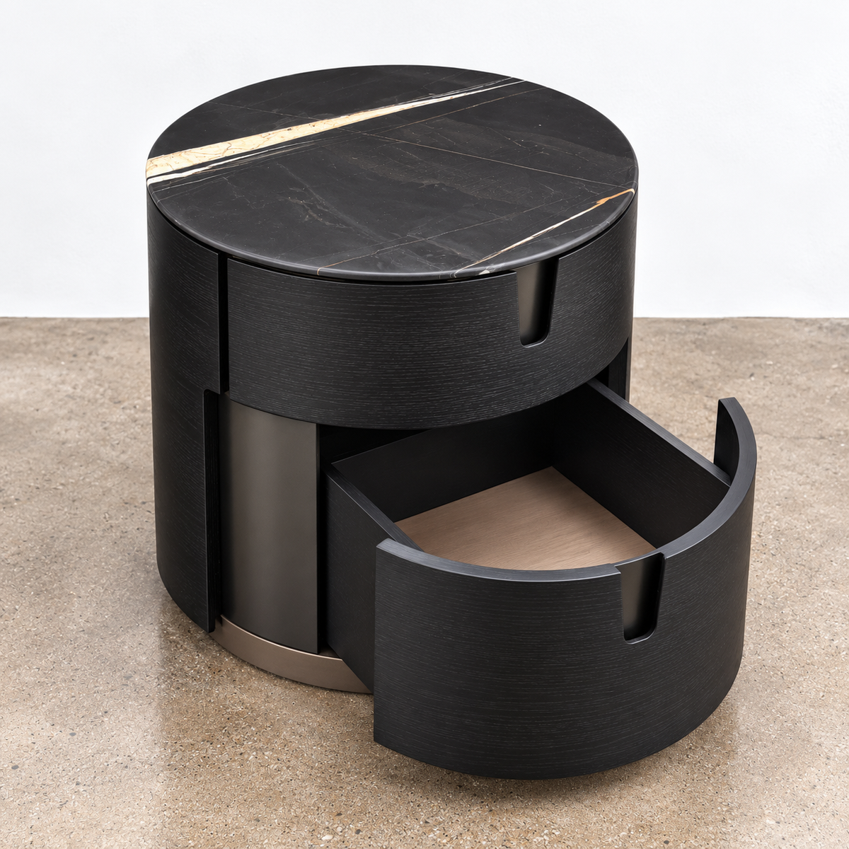 Two cylindrical Porada Tylsa 54 Nightstand Set of 2 units with dark marble tops featuring a single light-colored vein.