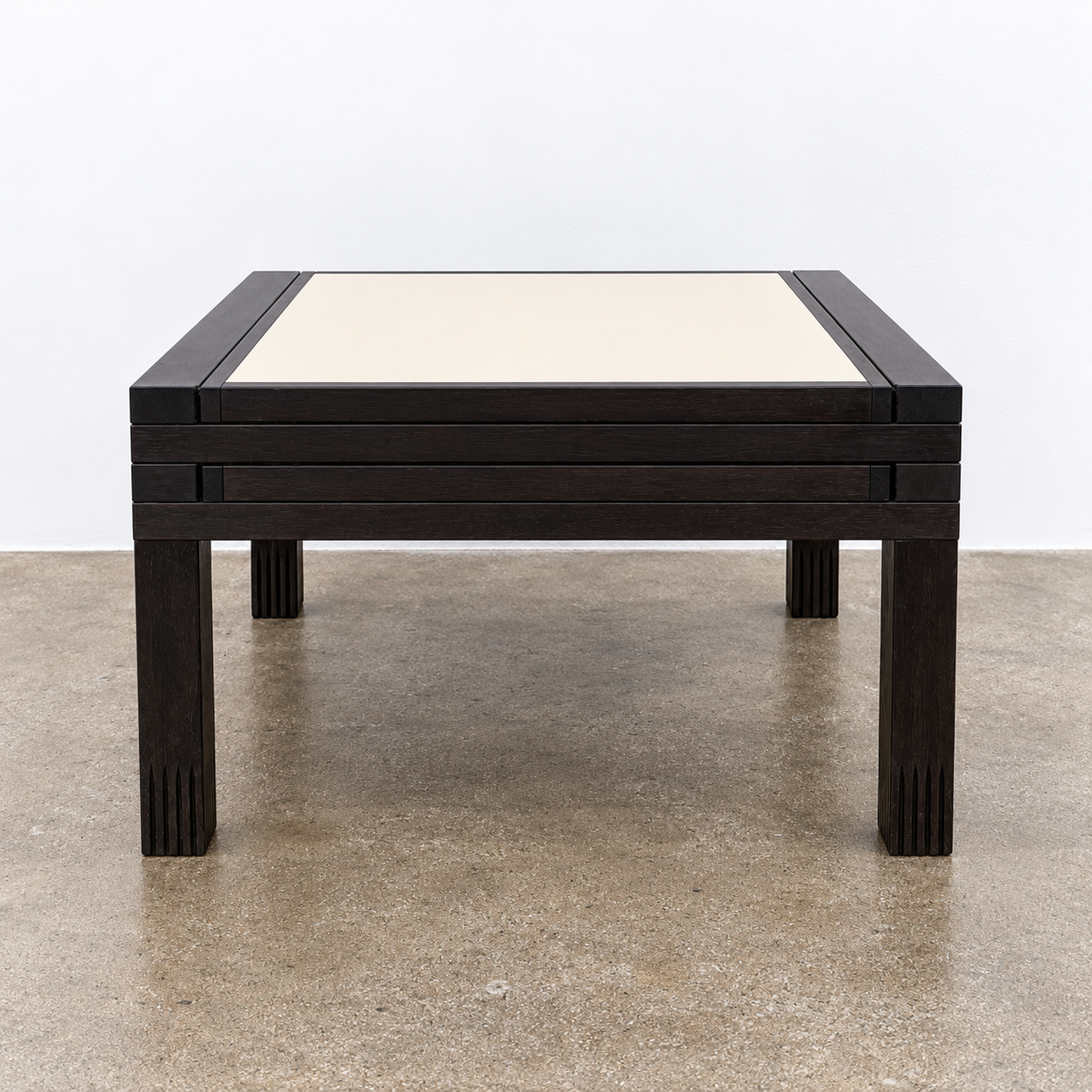 Bellato Hexa Expandable Coffee Table featuring an 1980s-style solid wood frame with multiple white and cream sliding panels extending from the center.