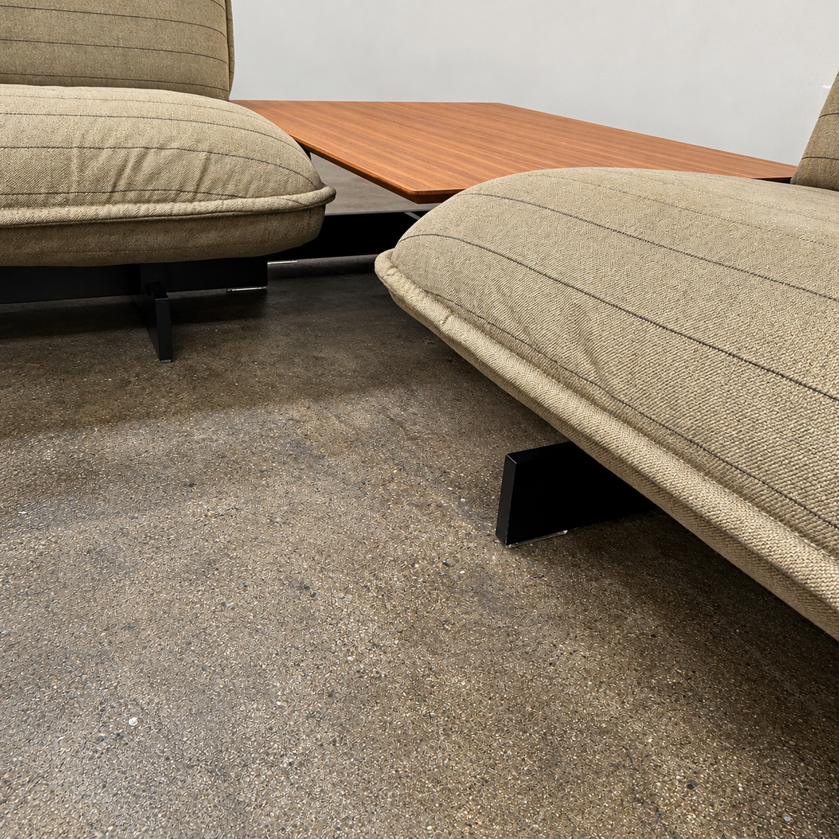 Two tan upholstered Cassina Beam Sectional Sofa with Corner Table sections connected by a rectangular wooden corner table.