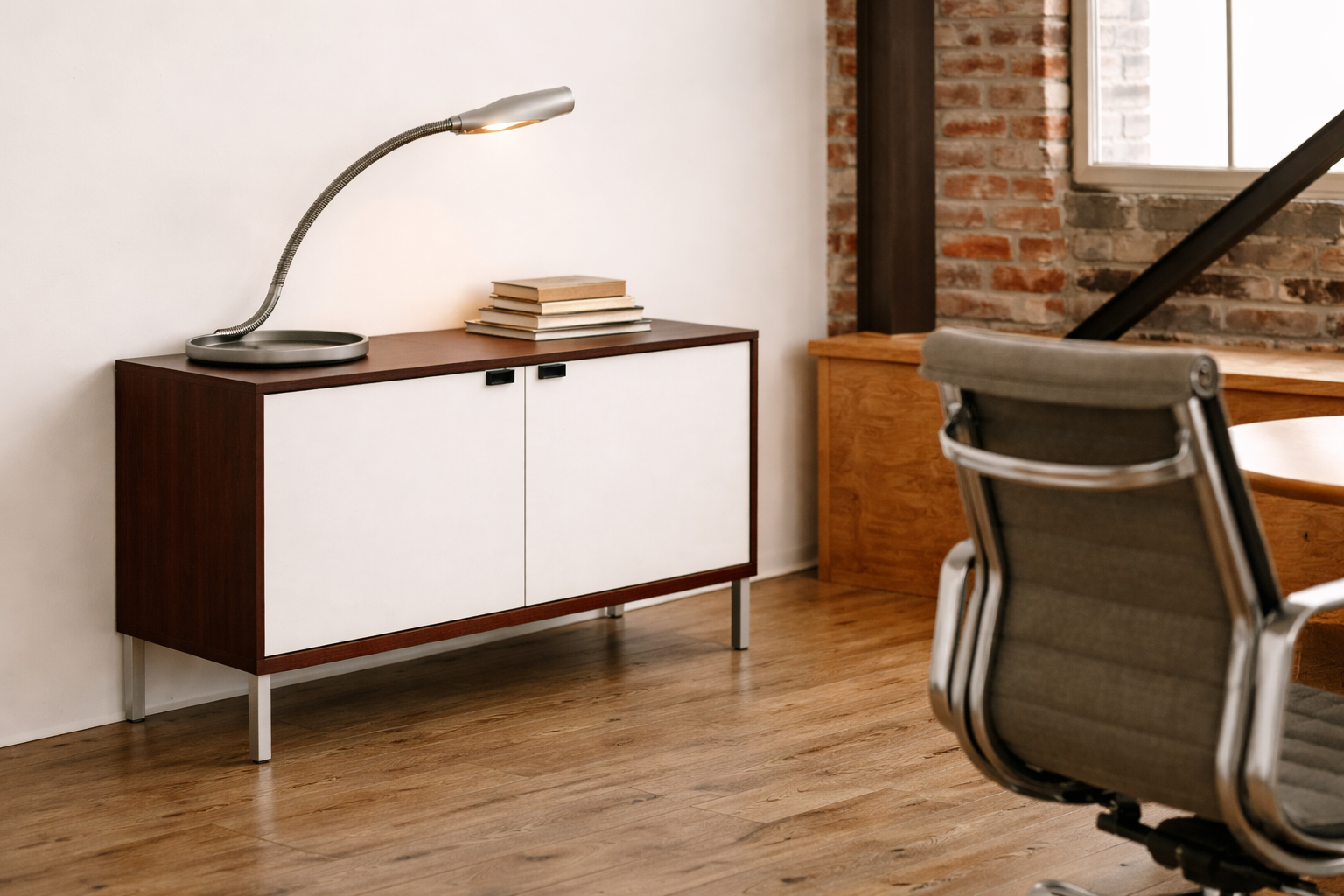The Knoll Vintage Florence Knoll Office Storage features a dark wood frame, white sliding doors, and metal legs—perfect as a stylish credenza or office storage against a plain white wall.