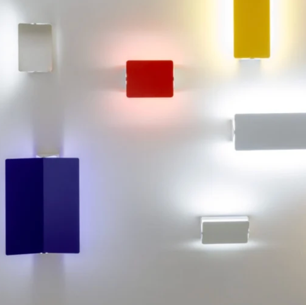 Rectangular yellow Nemo Applique à Volet Pivotant Double wall light fixture with a pivoting shutter.