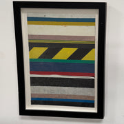 Oscar Berglund Framed Art by Modern Resale shows horizontal colored stripes and a yellow-black diagonal caution stripe, mounted on a white wall.