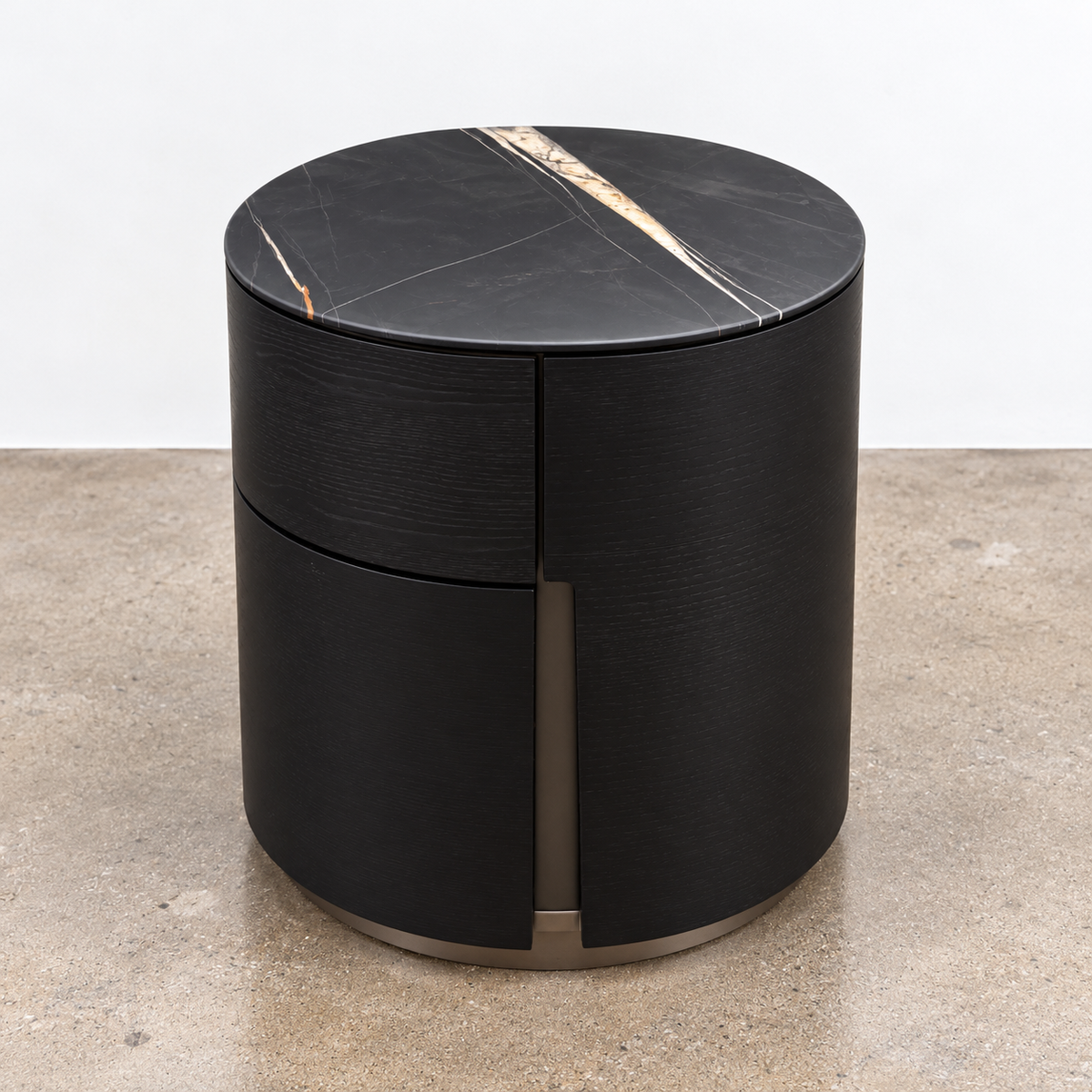 Two cylindrical Porada Tylsa 54 Nightstand Set of 2 units with dark marble tops featuring a single light-colored vein.