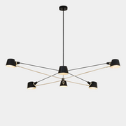 The Pivot chandelier from Ravenhill Studio features six adjustable arms with cone-shaped shades in a modern black finish, suspended against a plain light background to exemplify sculptural lighting characteristic of Ravenhill Studio’s contemporary designs.