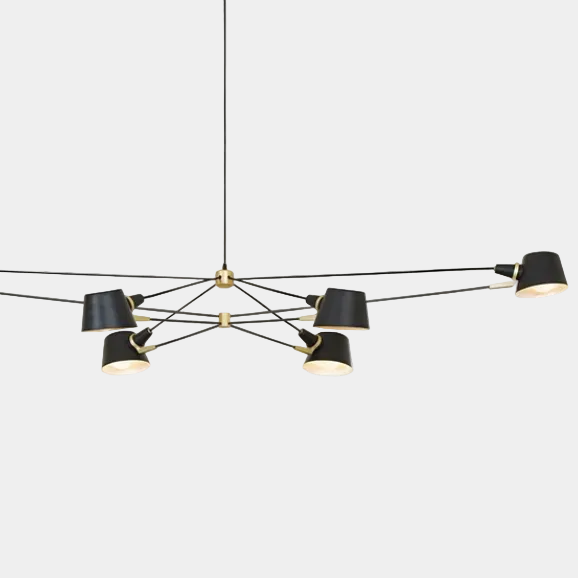 The Pivot chandelier from Ravenhill Studio features six adjustable arms with cone-shaped shades in a modern black finish, suspended against a plain light background to exemplify sculptural lighting characteristic of Ravenhill Studio’s contemporary designs.