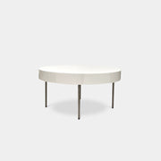 The Ligne Roset White Lacquer Needle Table features a sleek lacquer top and four slender metal legs, perfectly exemplifying modern minimalism against a plain background.