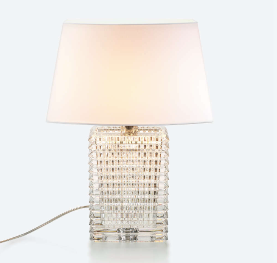 A Baccarat Eye Table Lamp with a white shade by Nicolas Triboulot.