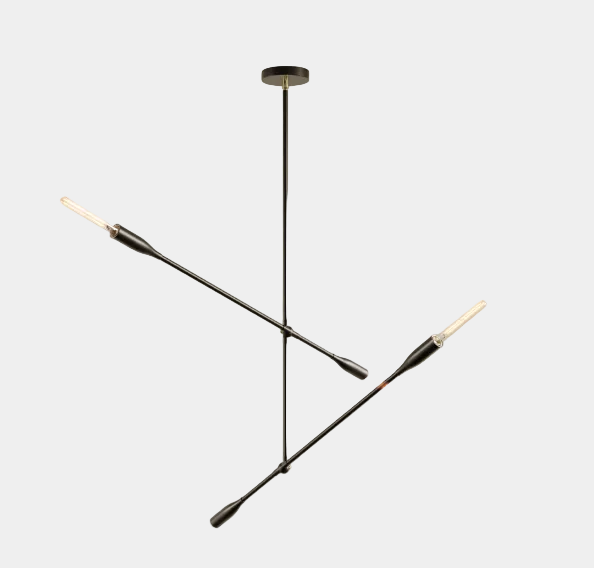 The Sorenthia 2-Arm Light by Ravenhill Studio is a minimalist black metal ceiling fixture featuring four exposed LED bulbs arranged in a cross shape against a plain white ceiling, offering statement lighting with adjustable arms for a modern pendant light aesthetic.