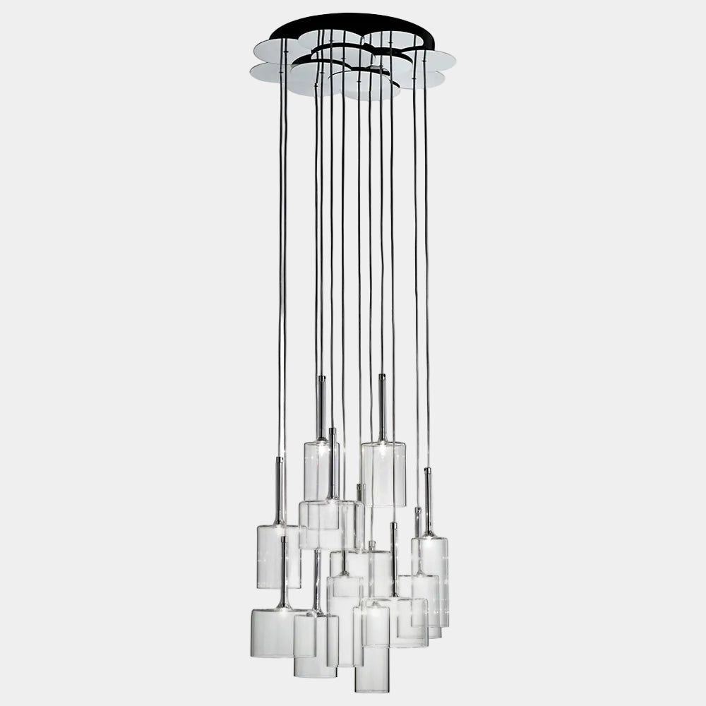 The AXO Light Axolight 12 Light Spillray Suspension Light features modern cylindrical glass pendants on black cords from a round ceiling mount, ideal for contemporary lighting schemes.