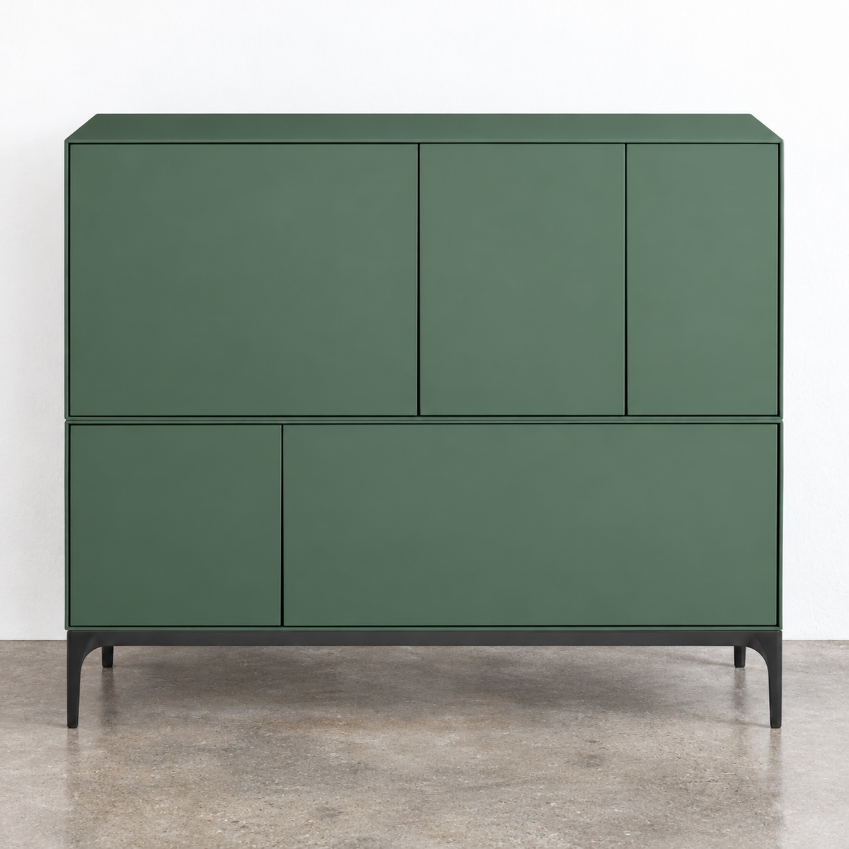 A sage green Treku Lauki cabinet featuring five asymmetrical doors and black metal legs in a contemporary design.