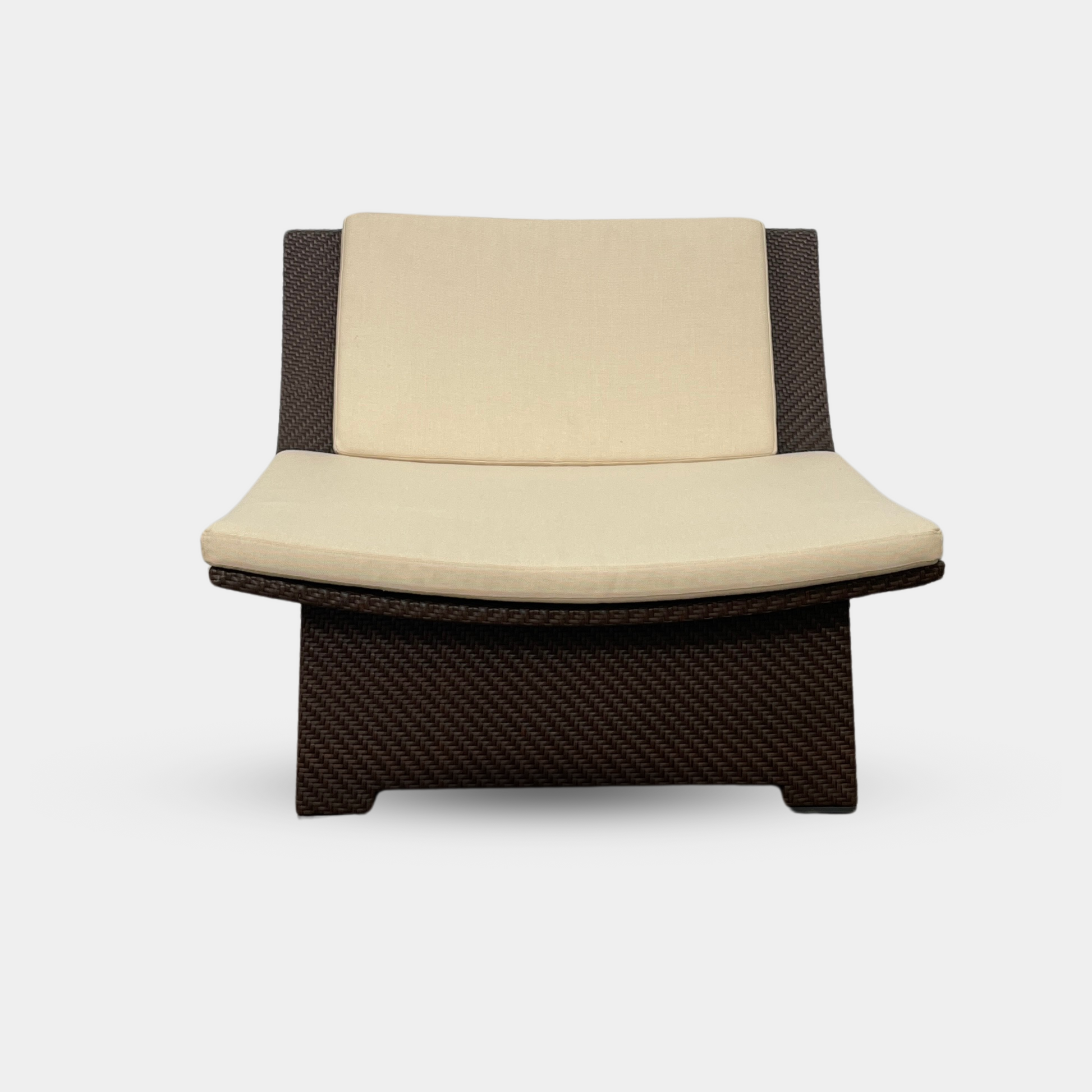 The Dedon Spa Outdoor Lounge Chairs set features two cream-cushioned seats made with proprietary fiber, beautifully displayed side by side against a simple white backdrop.