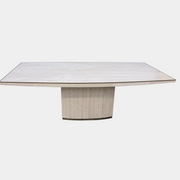 Rectangular Travertine and Brass Dining Table by Willy Rizzo with a brass edge inlay and a central column base.