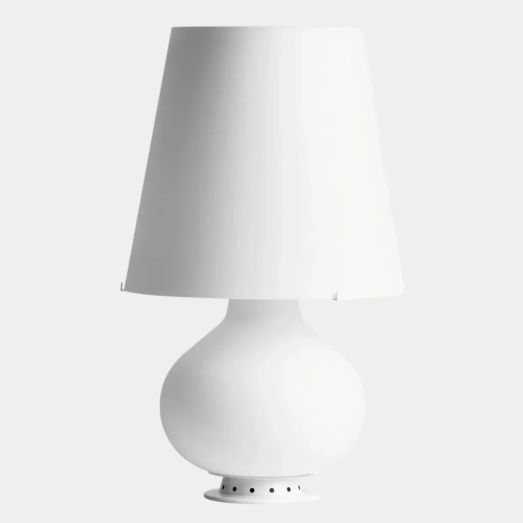 The Fontana Arte Table Lamp - Medium by Fontana Arte features a modernist design with a round base and wide, tapered lampshade, displayed against a plain light background.