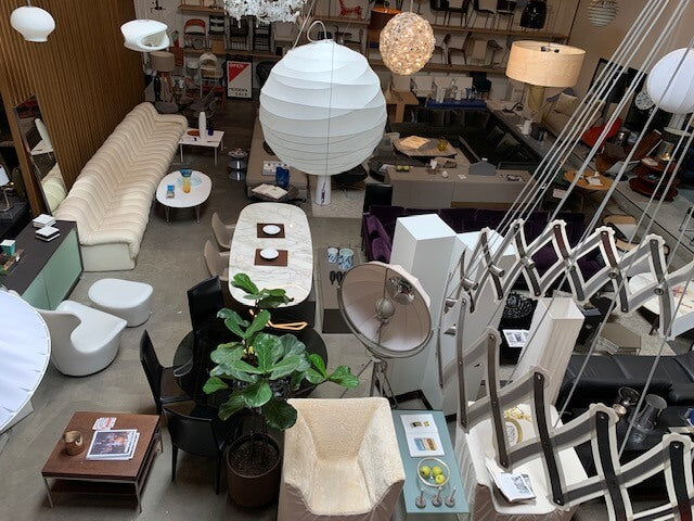 An aerial view of a store with a lot of furniture.