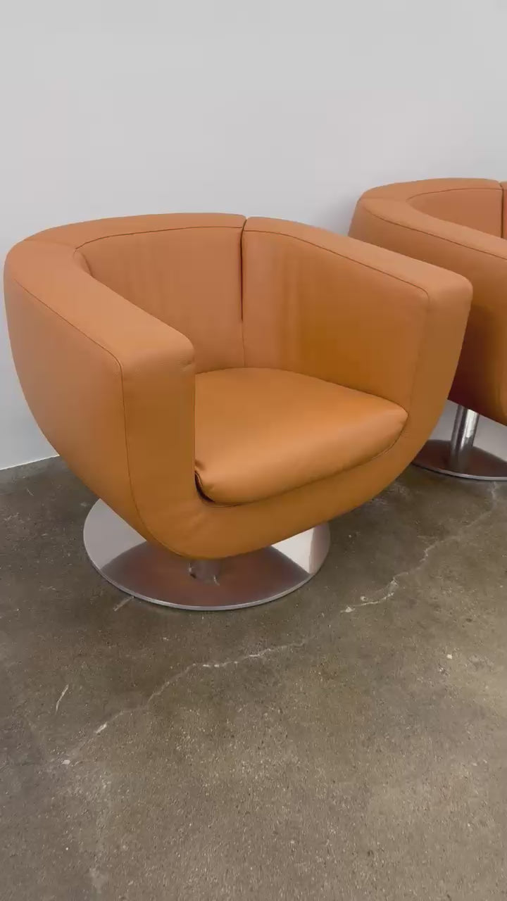 Load video: B&amp;B Italia Tulip Swivel Armchair