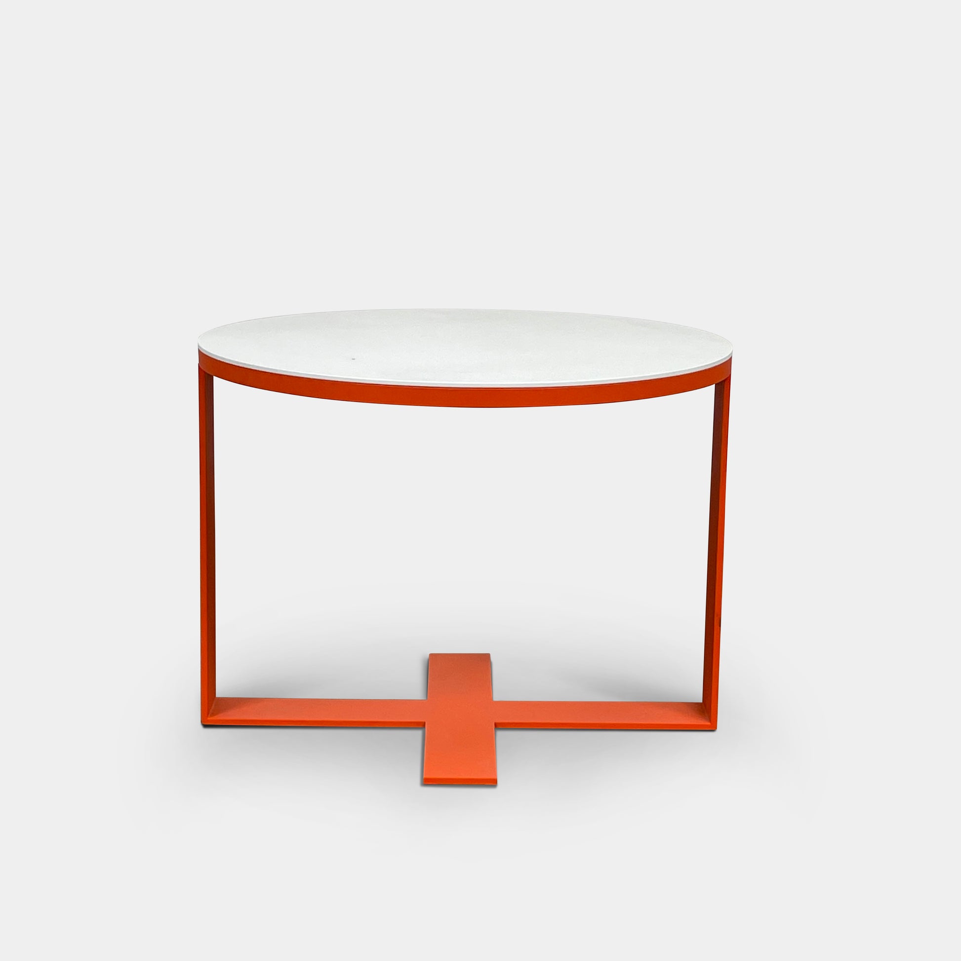 Two modern B&B Italia Eileen tables, featuring white lacquer tops and vibrant orange frames, come in varying heights and unique designs to add a stylish touch to any living space.