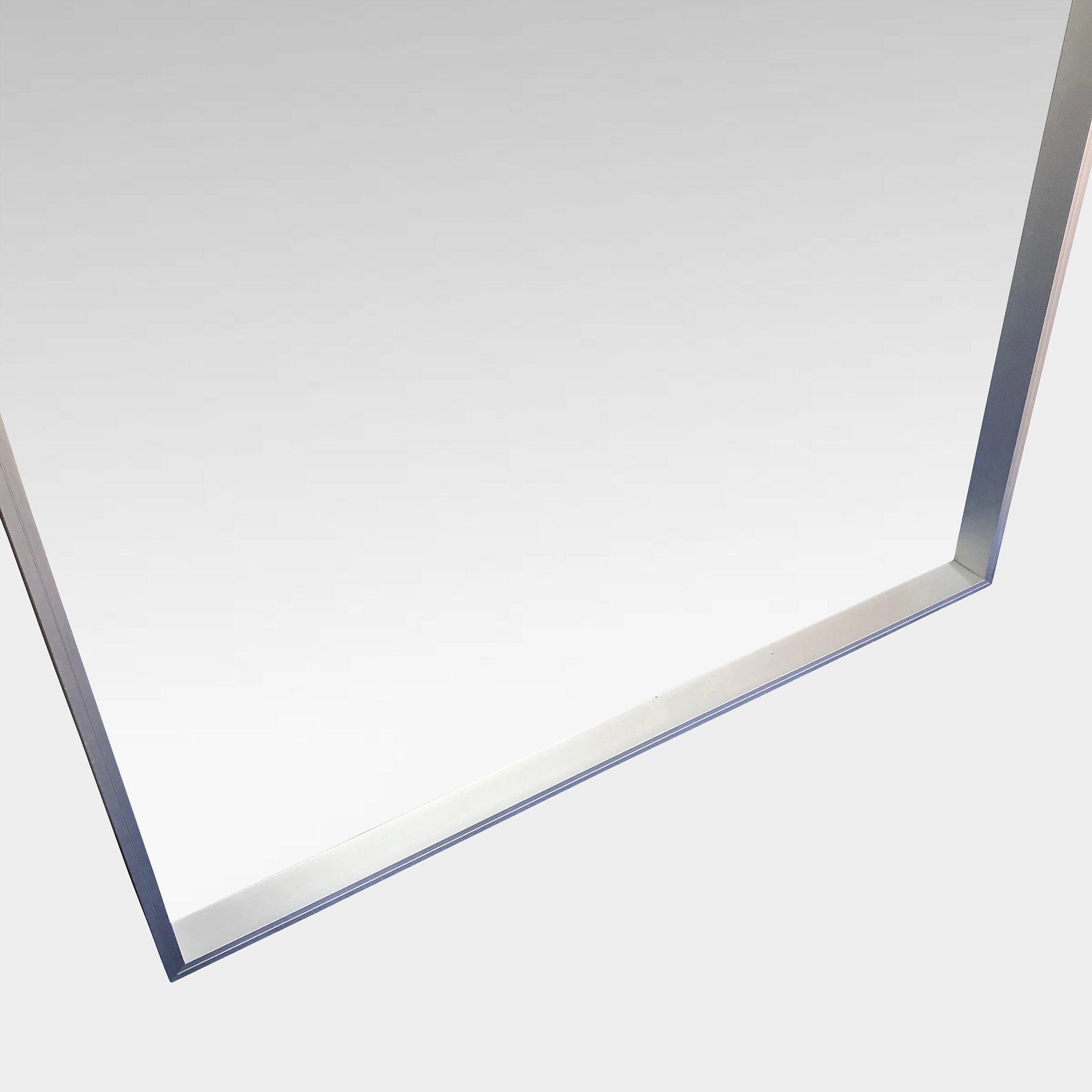 The Bellato Luciano Mirror Large Standing Wall features a sleek, metallic frame and rectangular design, ideal for enhancing space against a simple gray backdrop.