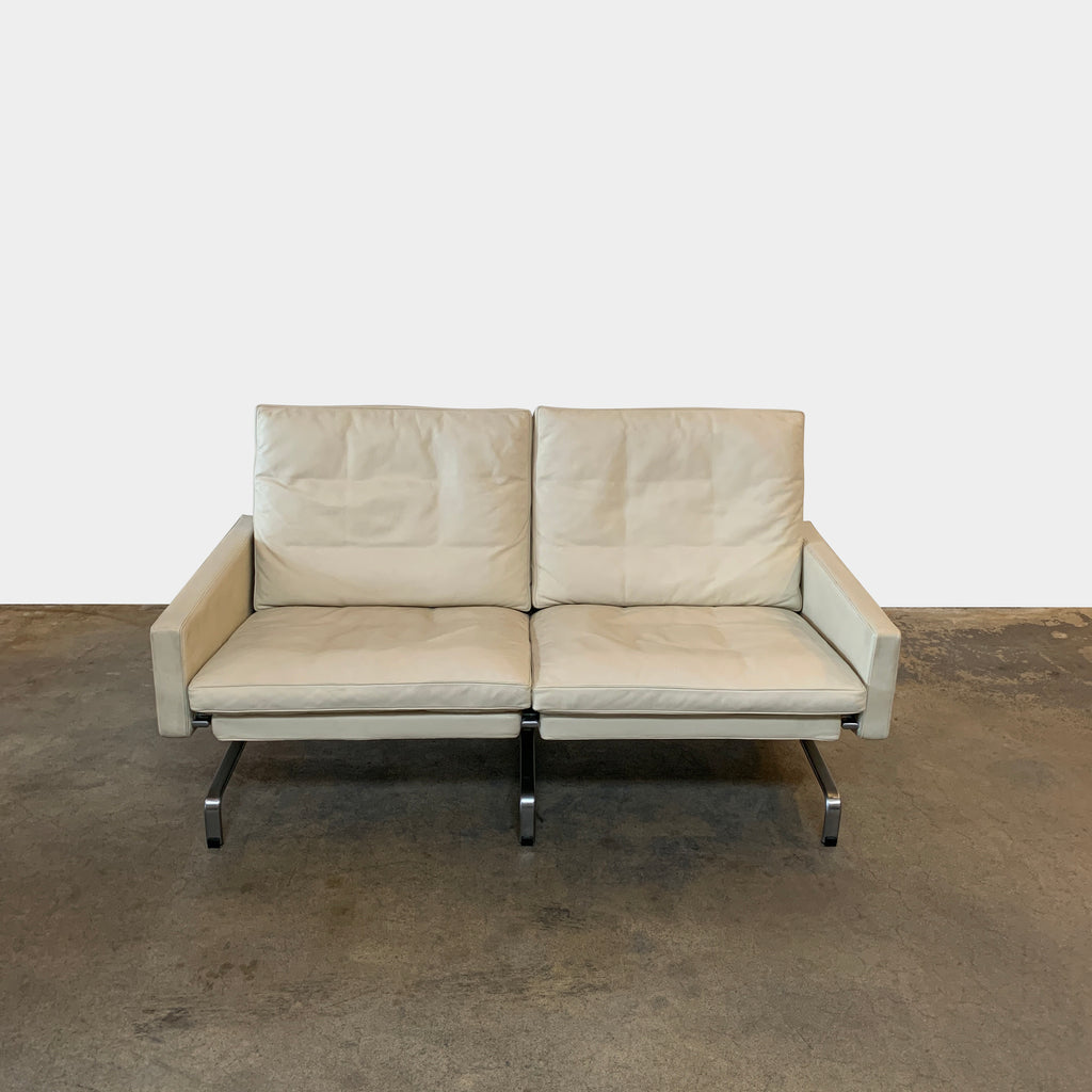 A Fritz Hansen PK 31 Leather Settee by Poul Kjaerholm with metal legs against a white background.