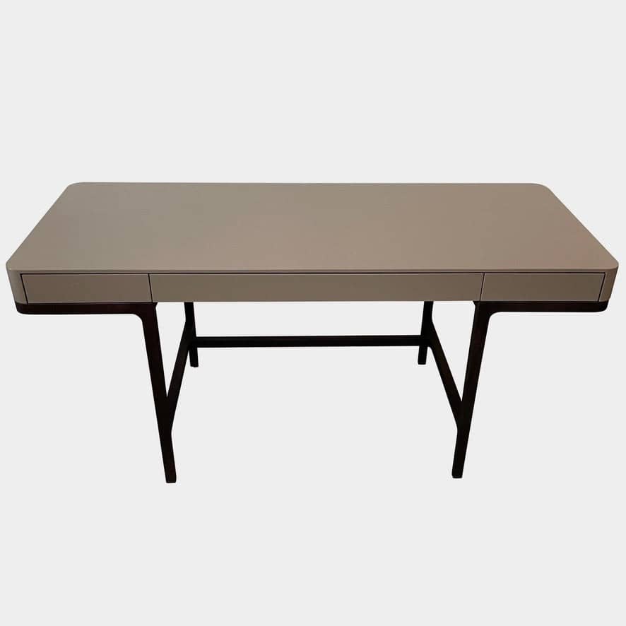 The Lema Victor Desk is a sleek and contemporary addition to any modern office space. Featuring black legs and a glass top, this desk exudes a sense of sleek sophistication. With its clean lines and