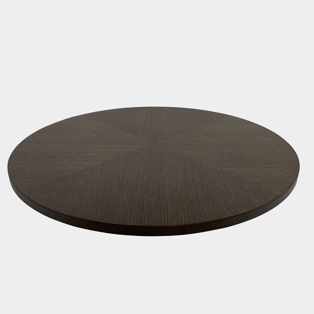 A round wooden table with a Maxalto Swivel Tray detail on a white background.