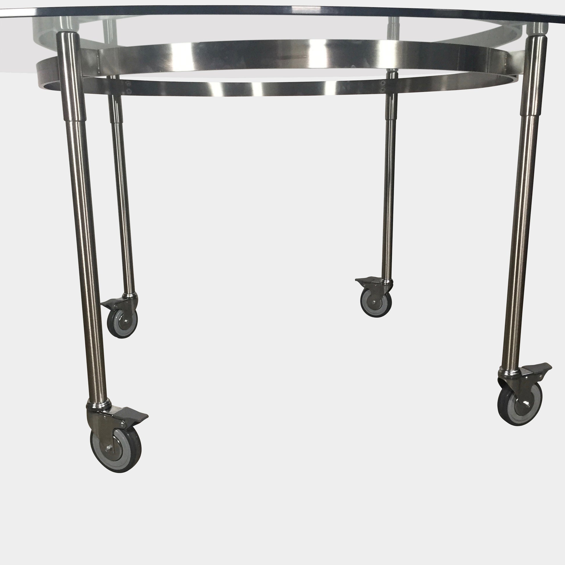 The Driade Ito Dining Table from Driade offers adaptability with its mobile design on wheels, making it easy to move around. It features a chrome base for a sleek and modern look.